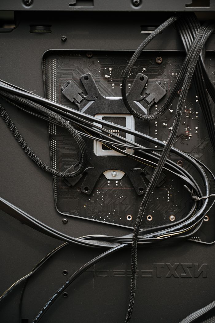 Detailed view of internal computer components and cables for maintenance or assembly.
